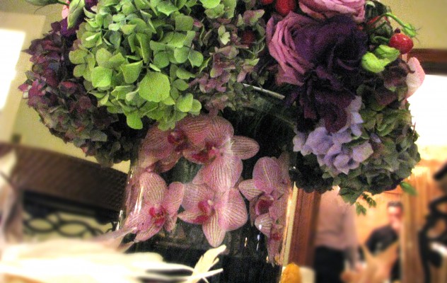 Orchids lining the vase Orchids lining the vase